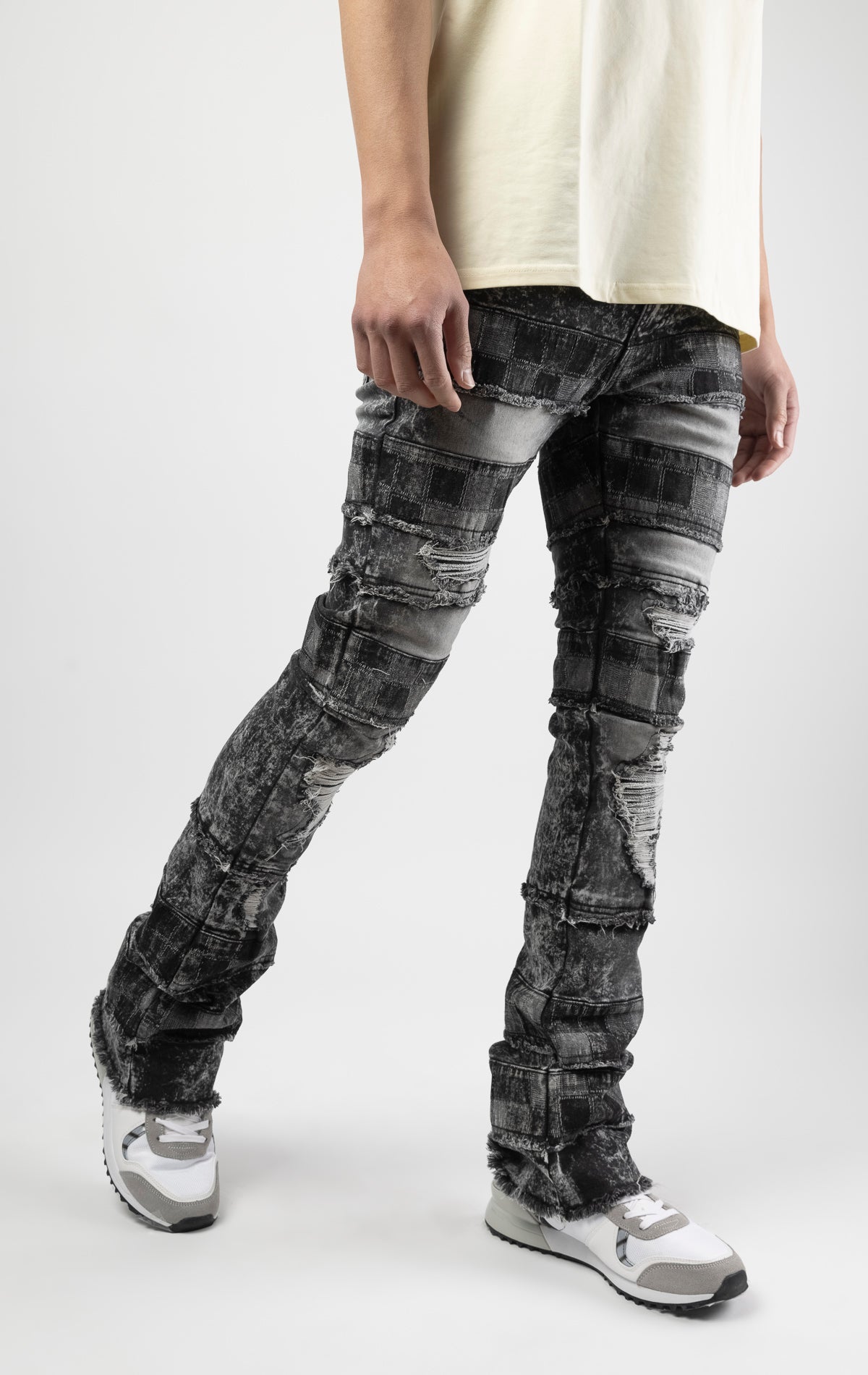 Black wash iconic stacked jeans crafted from high-quality, durable denim fabric consisting of 98% cotton and 2% spandex with a semi flare silhouette and a length of 35