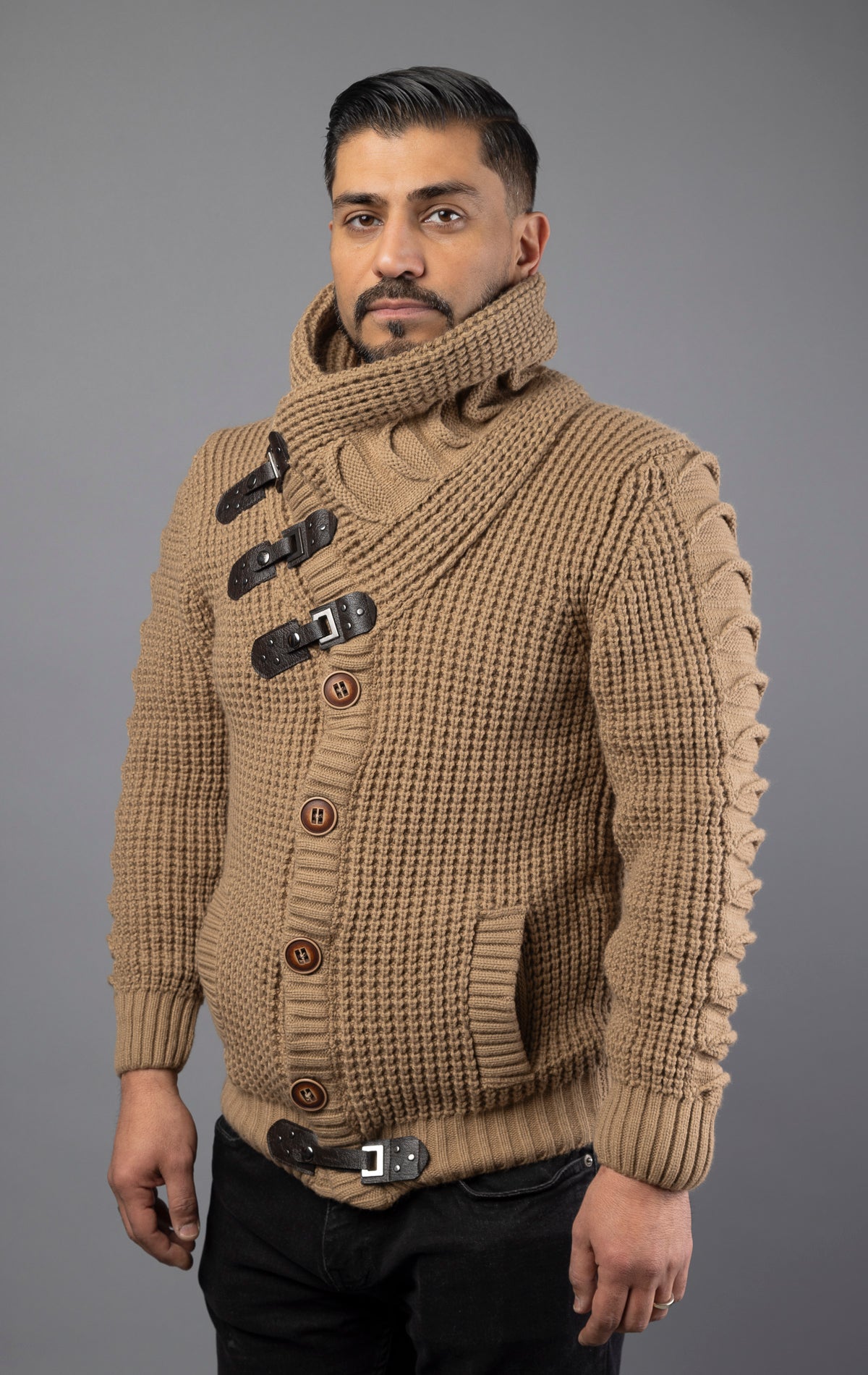 Model wearing brown versatile, high-quality sweater designed with heavy weight material to be worn in multiple ways