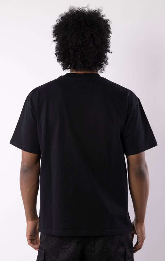 Black t-shirt with snarling dogs graphic under a moon and stars, featuring a bold print on the front and a relaxed crewneck fit.