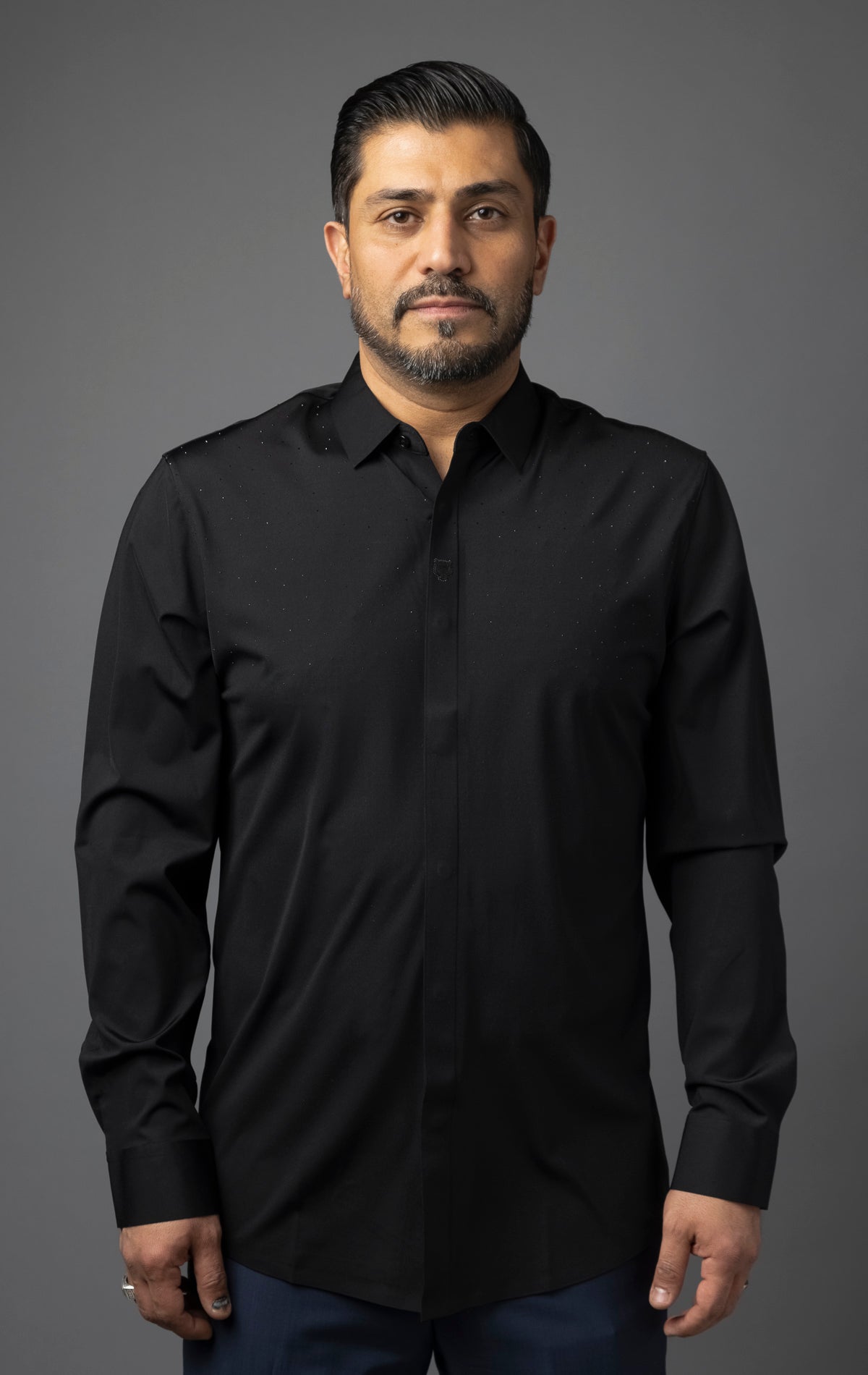 Men's formal black button-up shirt with long sleeves.