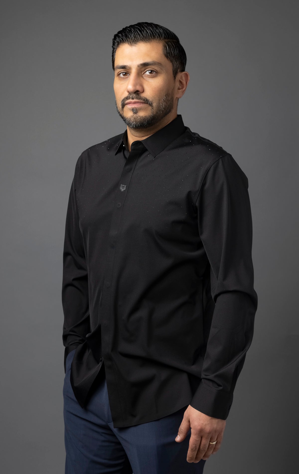 Men's formal black button-up shirt with long sleeves.