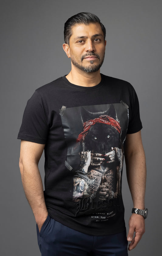 Blessed Inner Voice T-Shirt in black. Made from 100% cotton for a soft and breathable feel. Features a regular fit with slightly elongated fitted sleeves, a "don't loose sleep" message on the front, 3D self-colored "blessed" embroidery, and a woven "blessed" tab on the side seam.