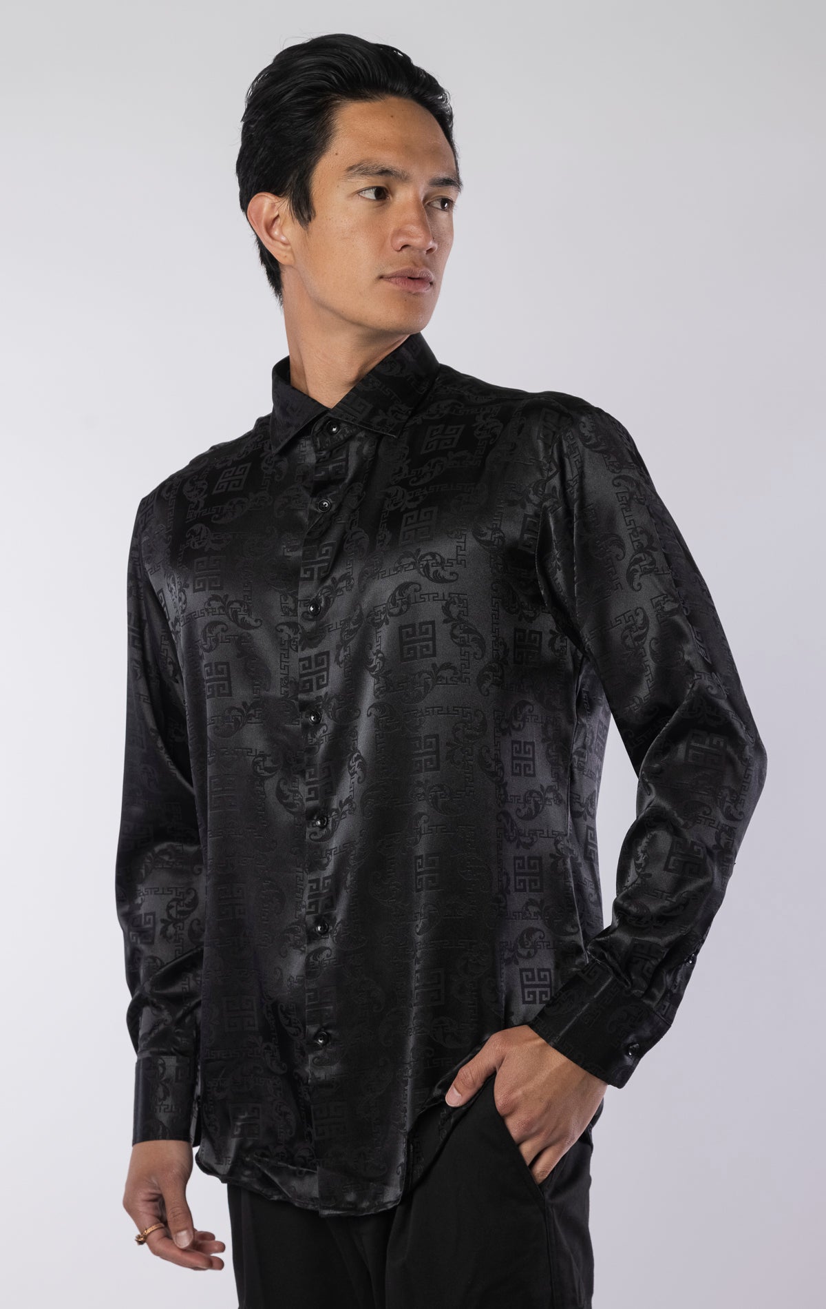 Men’s black long sleeve modern fit dress shirt with contrast cuffs and collar, made from a lightweight 97% polyester, 3% spandex blend.