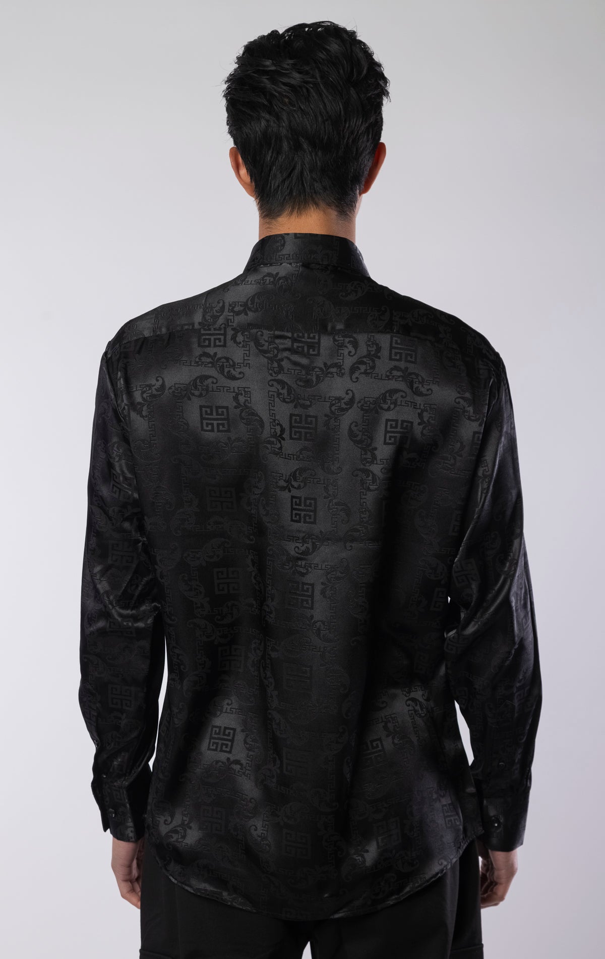 Men’s black long sleeve modern fit dress shirt with contrast cuffs and collar, made from a lightweight 97% polyester, 3% spandex blend.