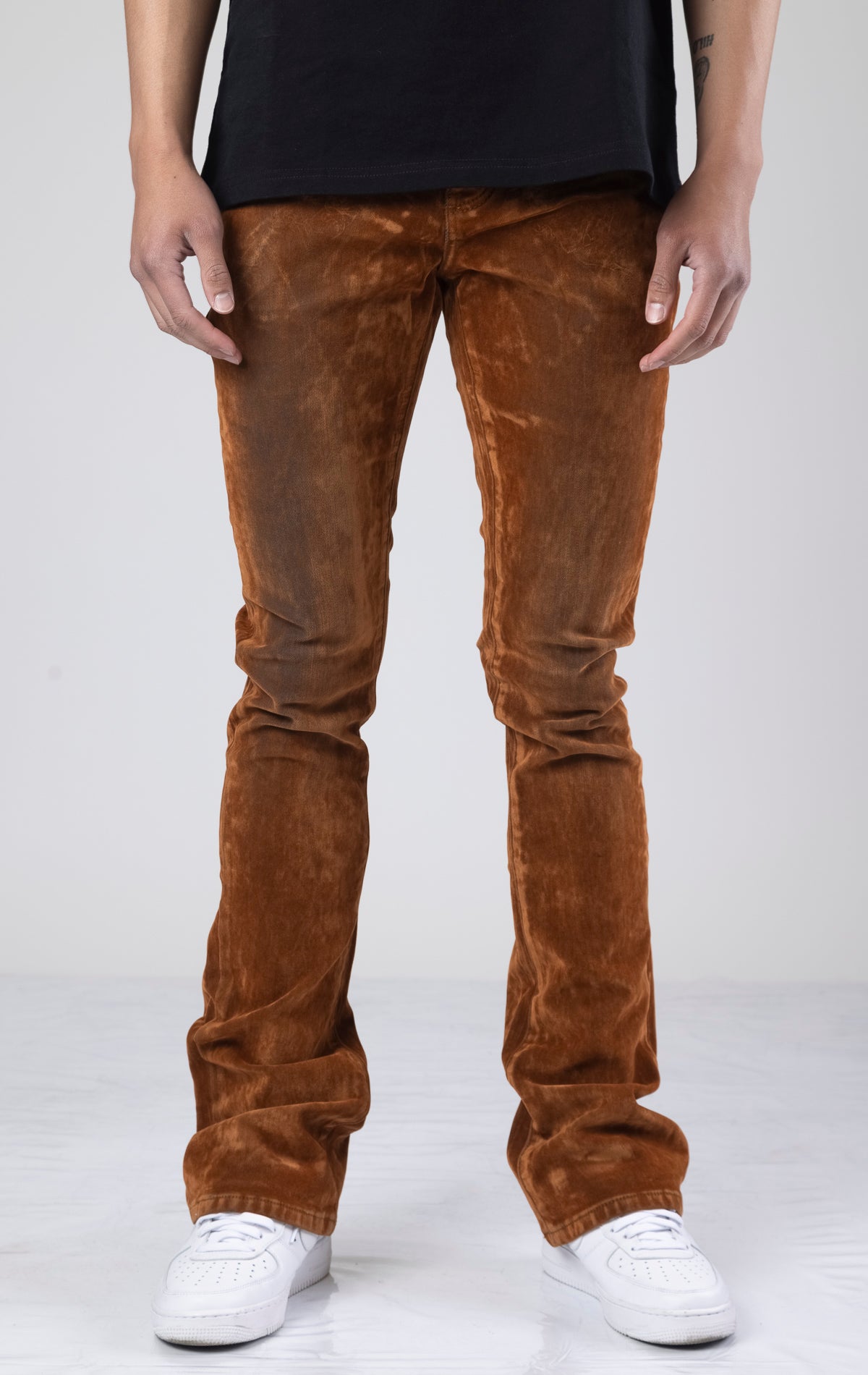 Brown suede stacked flare jeans with a comfortable cotton-spandex blend.