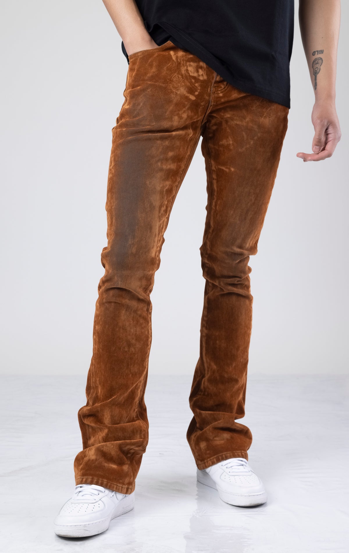 Brown suede stacked flare jeans with a comfortable cotton-spandex blend.