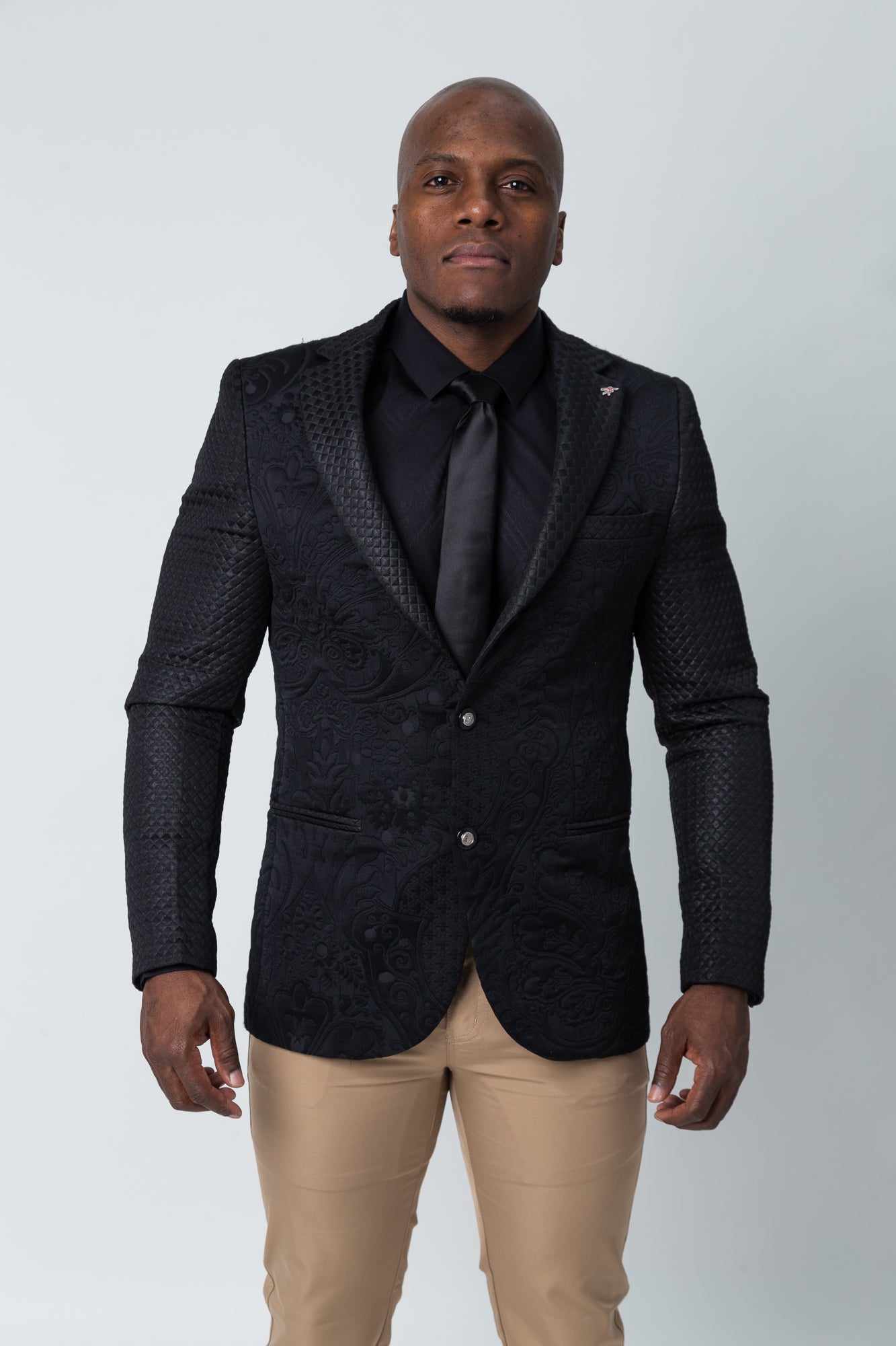 Black sleek fitted blazer with stretch fabric and gently lined with a button fastening.