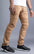 Khaki pants with rip and repair design and slim fit