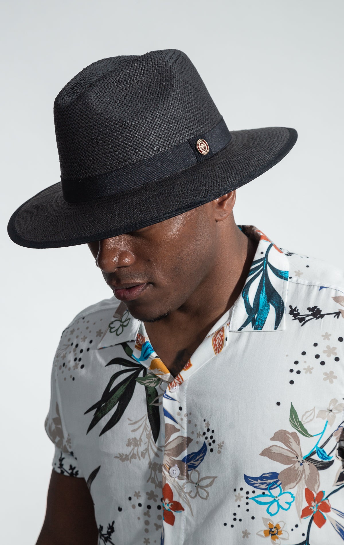 Limited edition natural straw fedora with 2.5" snap brim and contrasting under brim from the Empire Collection.