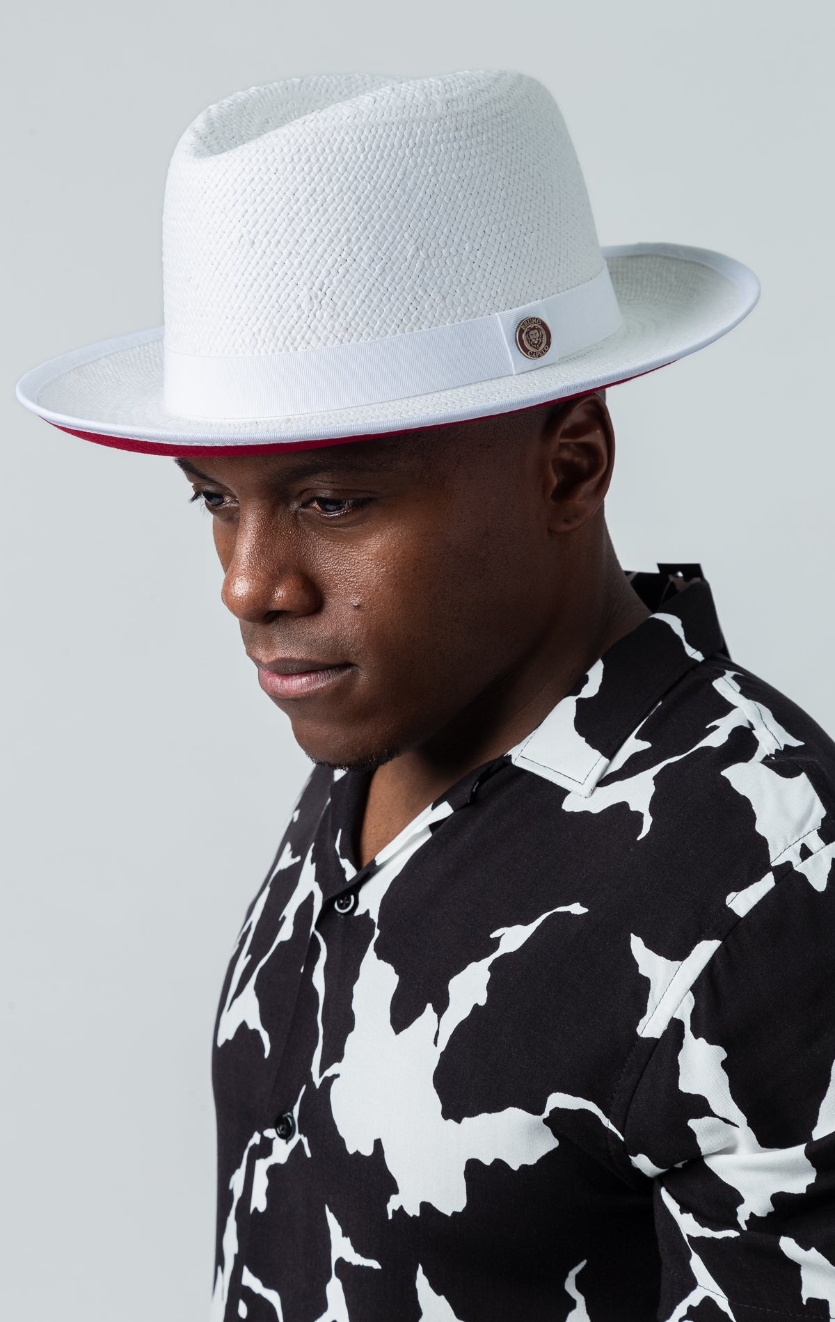 Limited edition natural straw fedora with 2.5" snap brim and contrasting under brim from the Empire Collection.