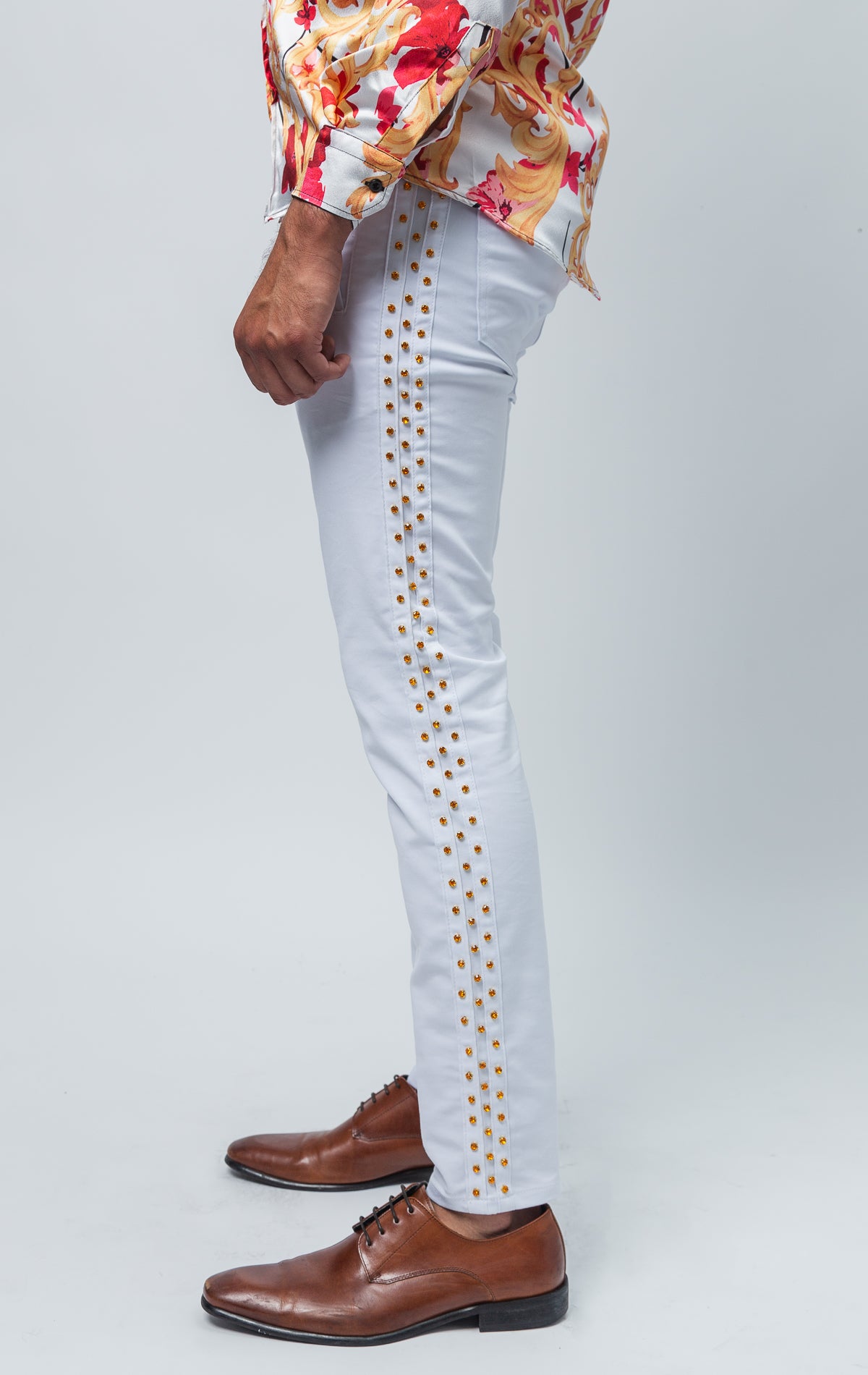 White pants with gold rhinestones 