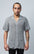 Grey short-sleeve button-up crafted from knitted fabric