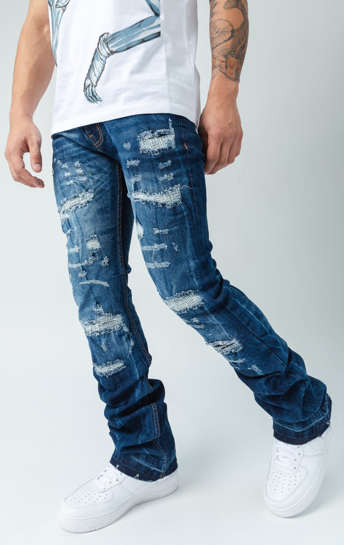 Worn down stacked denim in blue