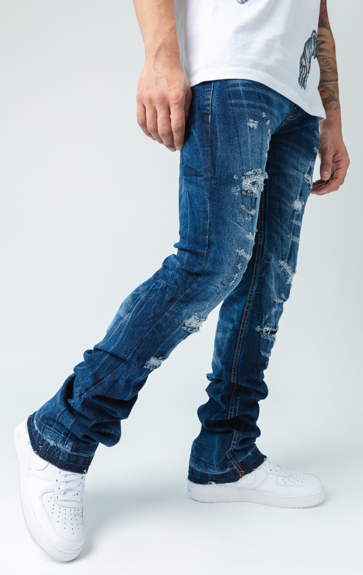 Worn down stacked denim in blue