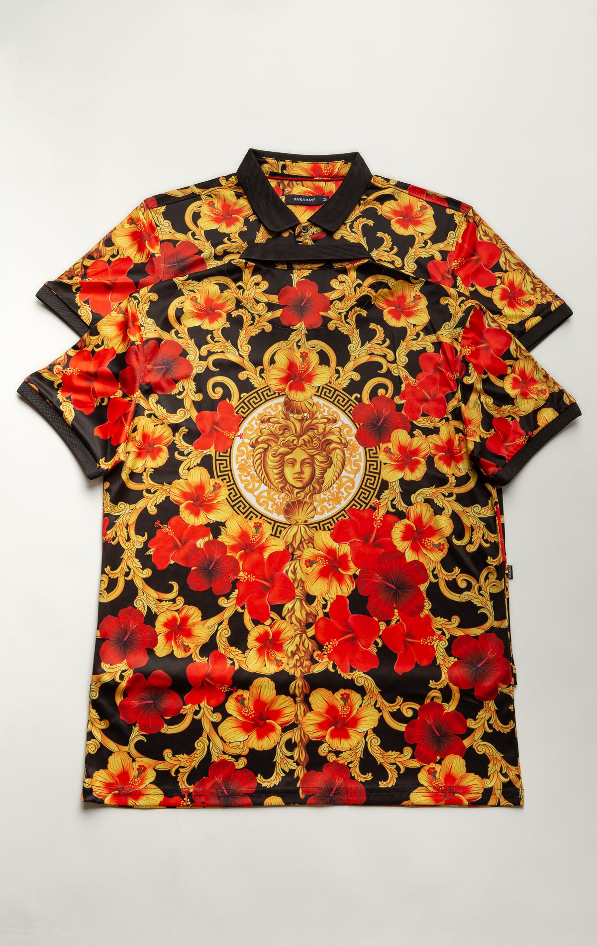 Printed short-sleeve polo shirt with a contrasted solid color collar and three-button closure.