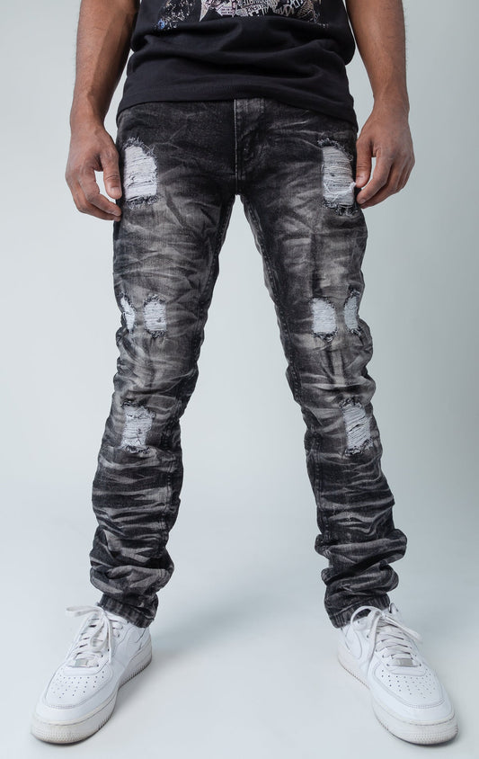 Black ripped low-waisted and slim jeans.