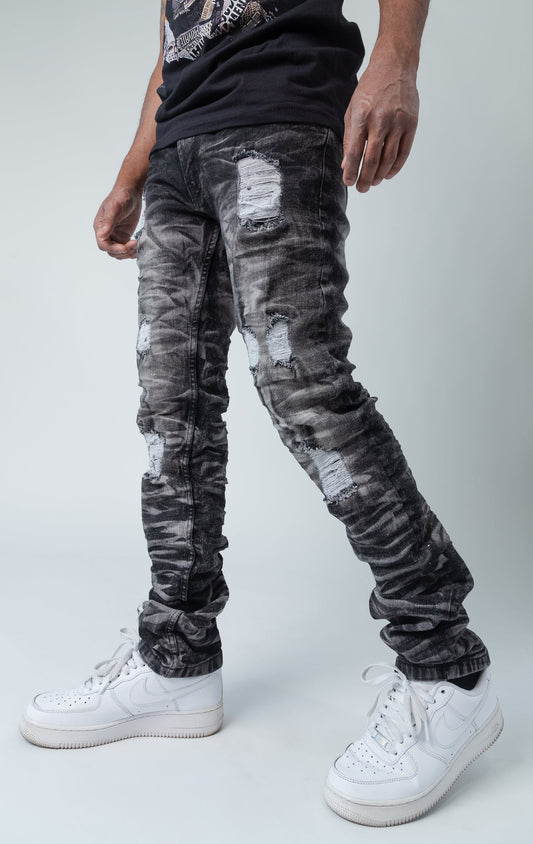 Black ripped low-waisted and slim jeans.