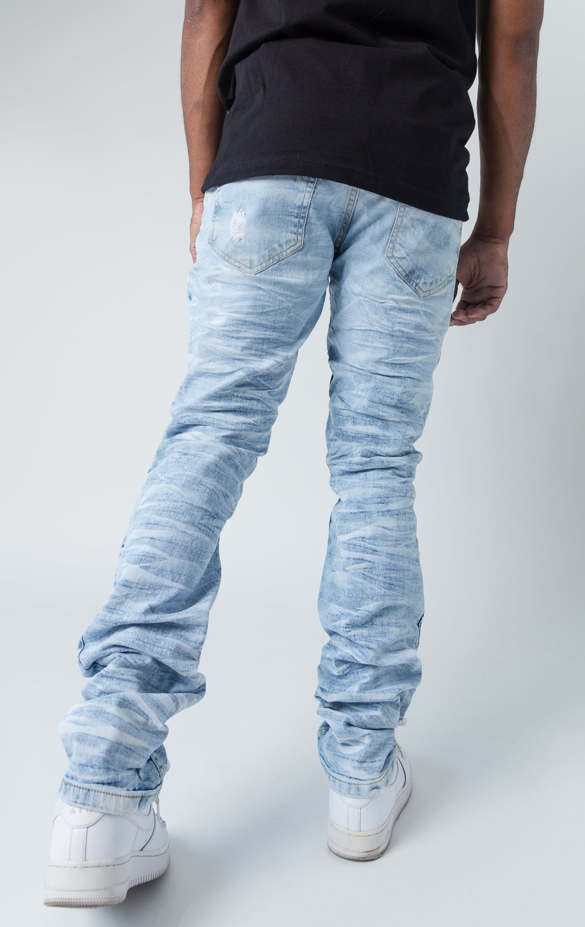 Ice blue ripped low-waisted and slim jeans.