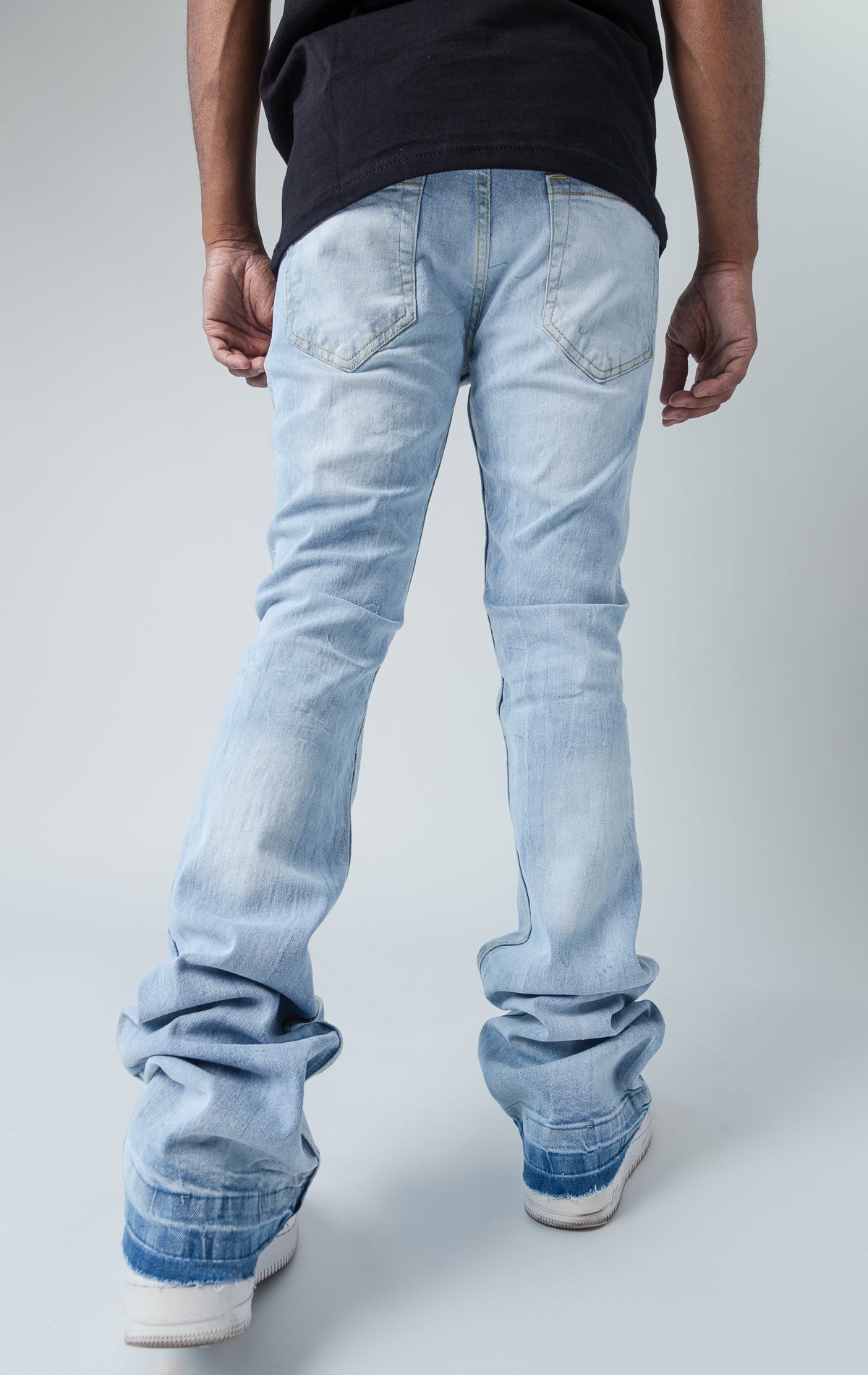 Worn down stacked denim in ice blue