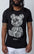 Black George V Paisley Teddy T-Shirt, designed with a baroque pattern adorned with sparkling rhinestones. Crafted with quality materials, this T-shirt offers superior comfort and durability.