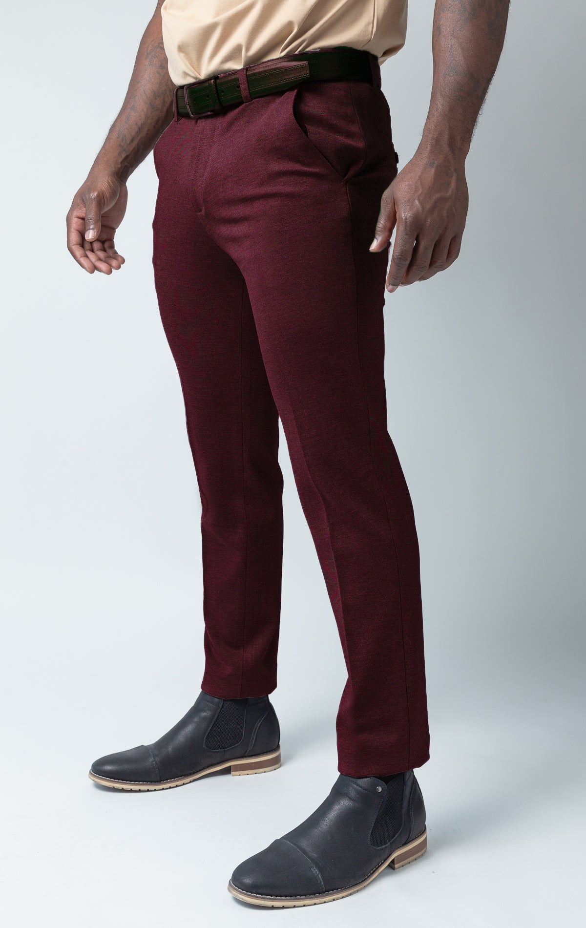 Burgundy dress pants with elastic waistband technology.