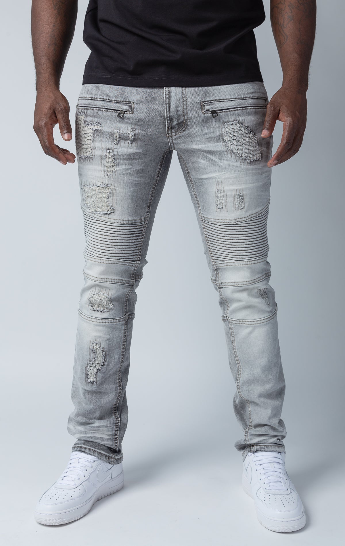 Grey pants with rip and repair design and slim fit