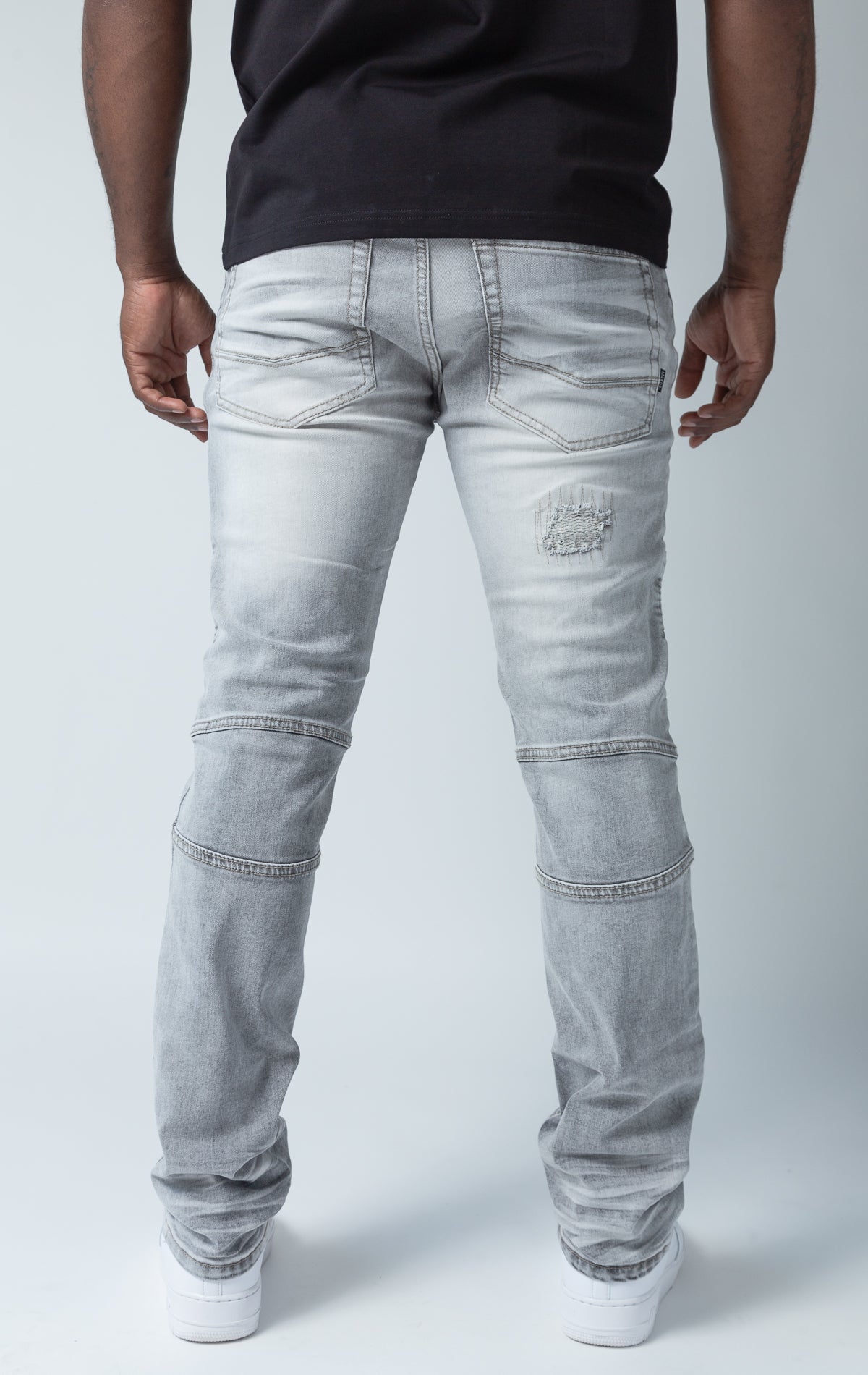 Grey pants with rip and repair design and slim fit