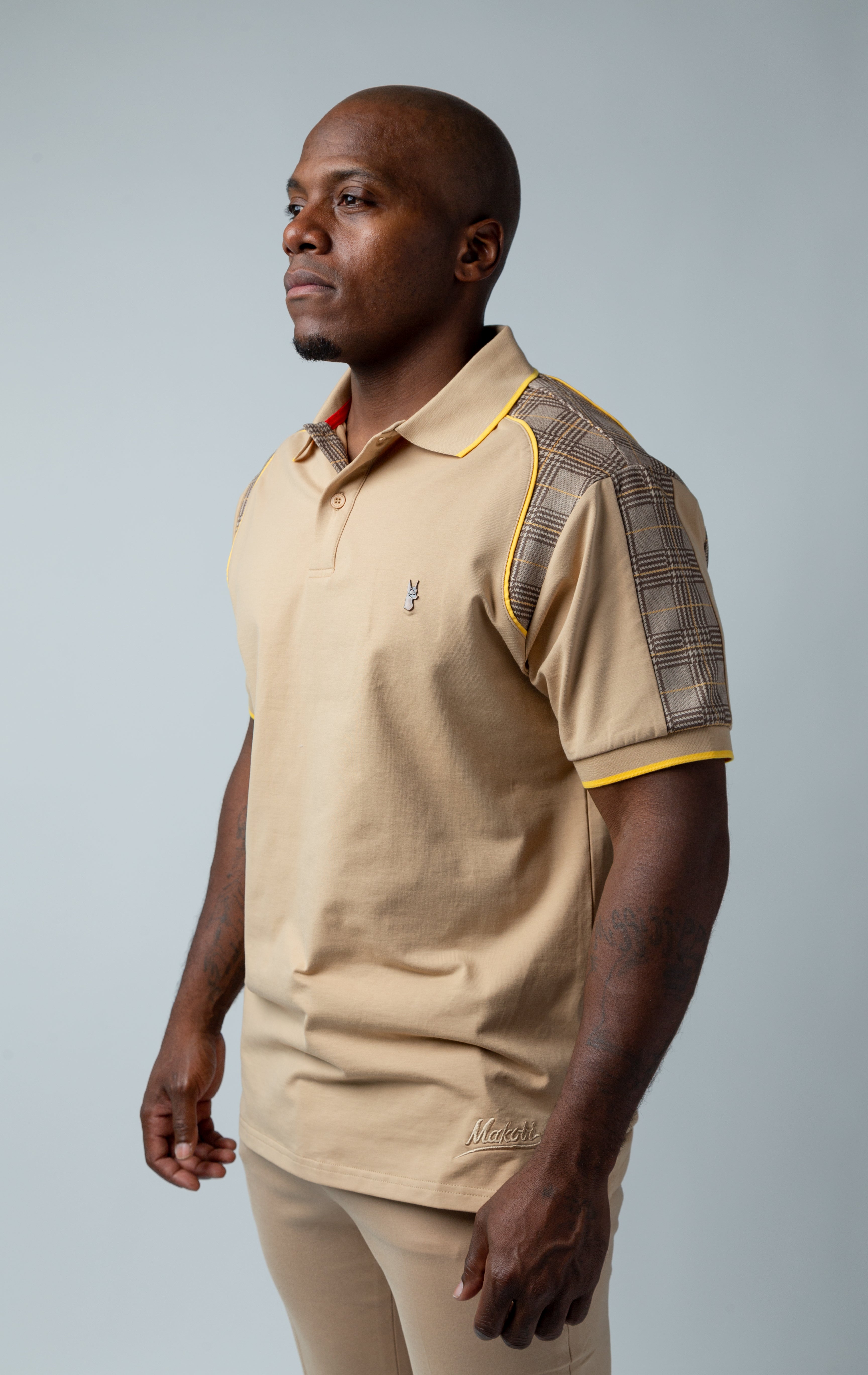 Khaki Polo shirts featuring a distinctive plaid yoke