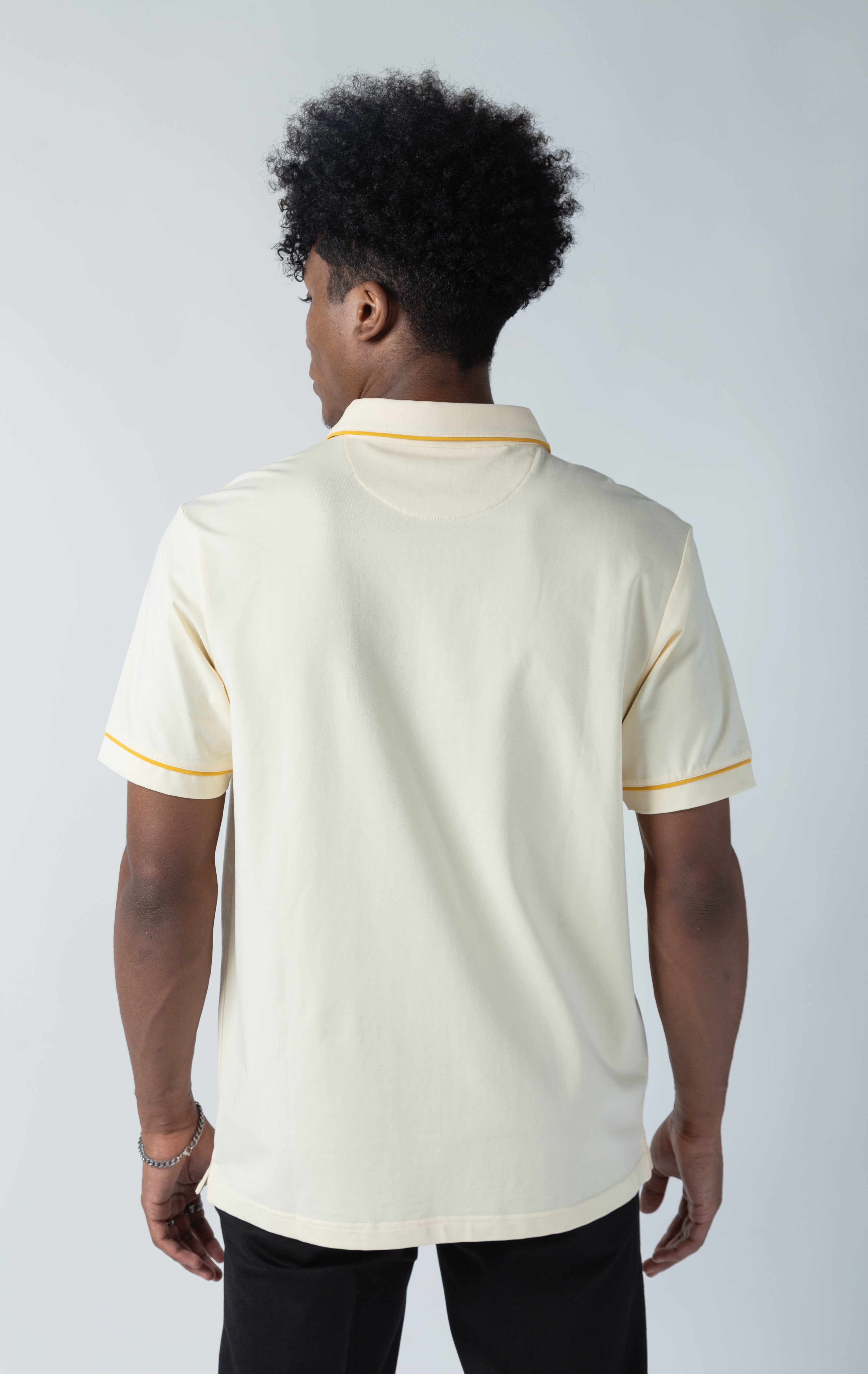 Natural color Luciano stretch premium jersey polo shirt with collared detailing, short-sleeved composition, three button front fastening. MAKOBI custom made design