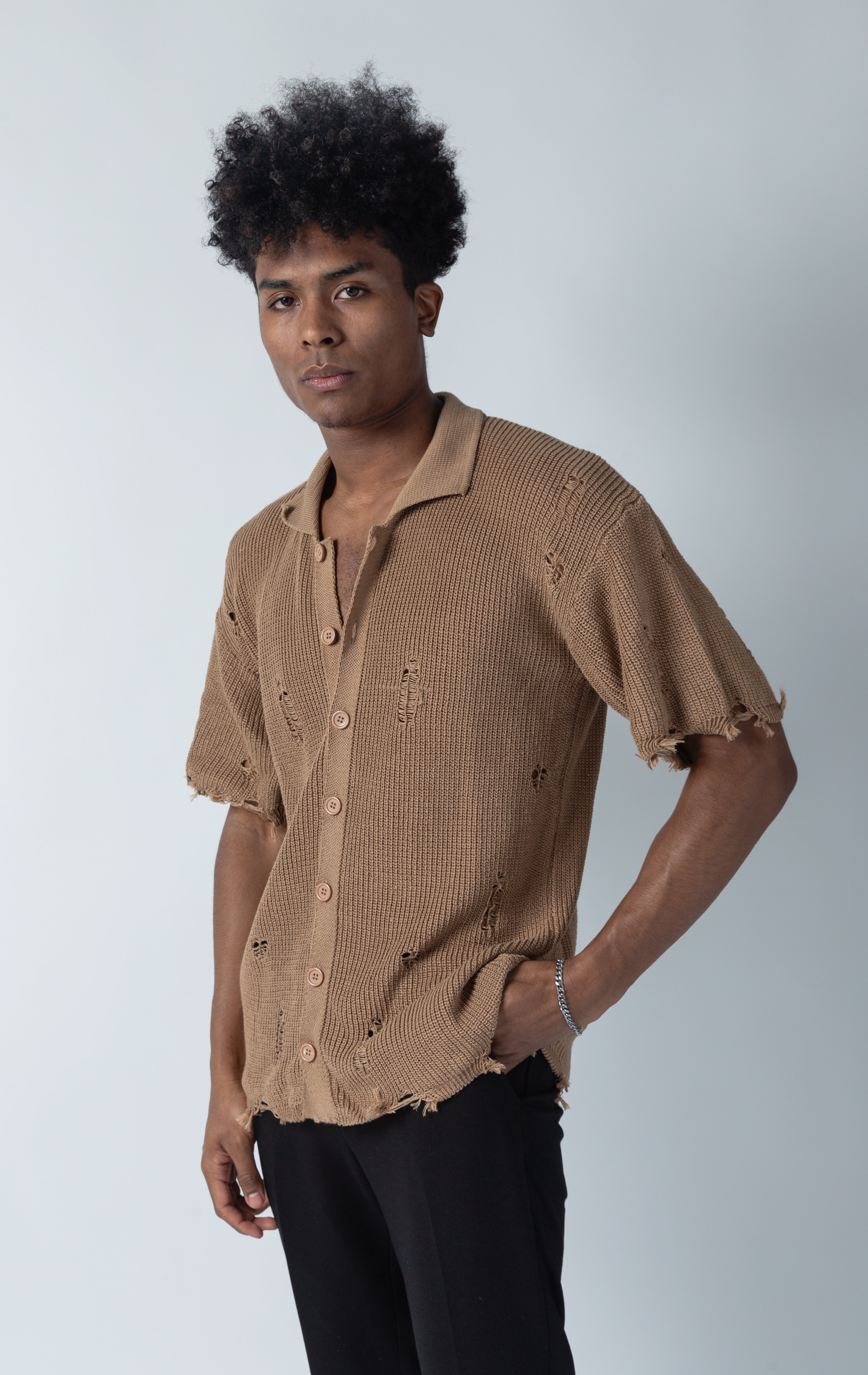 Brown short-sleeve button-up crafted from knitted fabric
