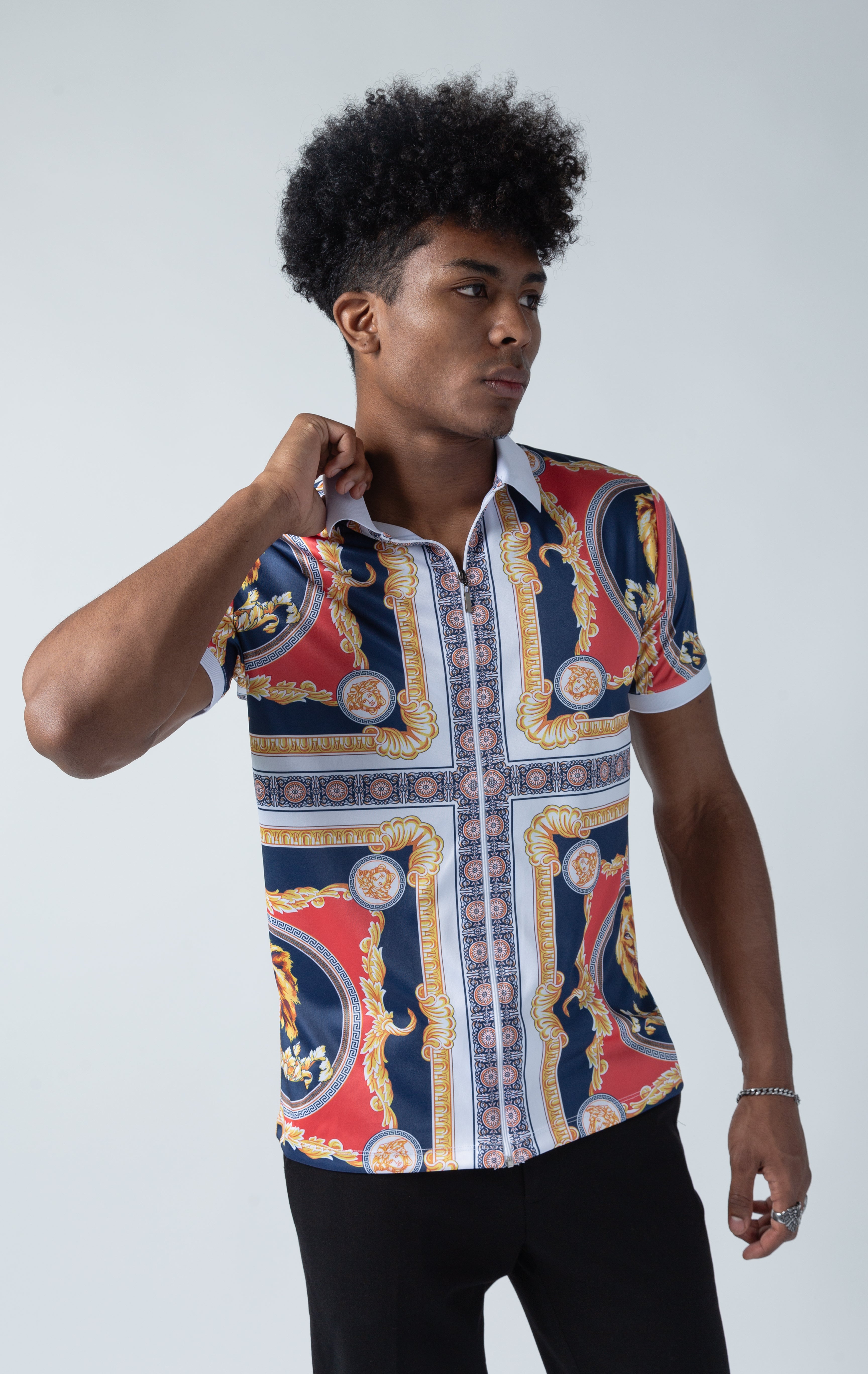 Patterned polo shirt with full length zipper closure.