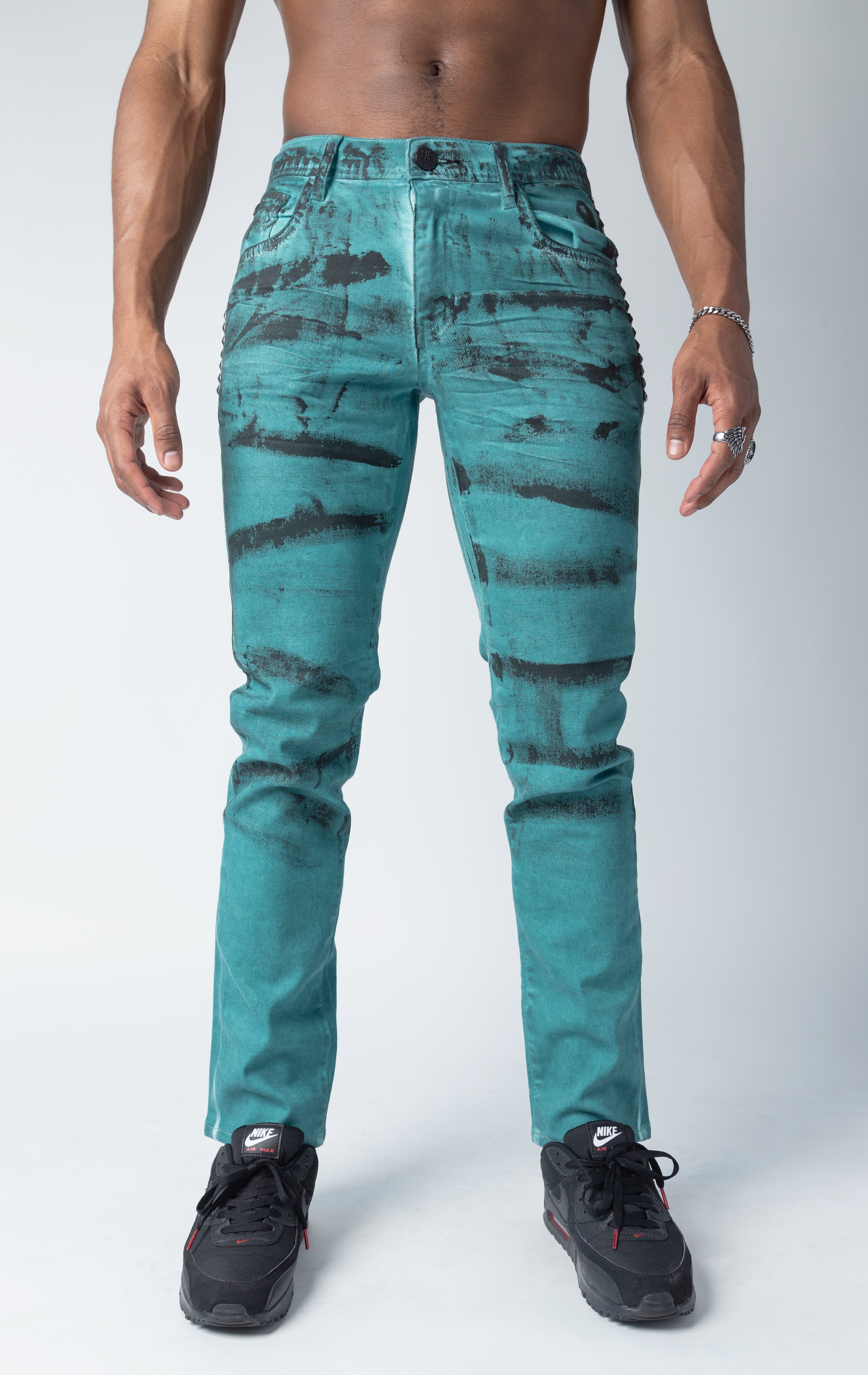 Jade color pants with distressed style 