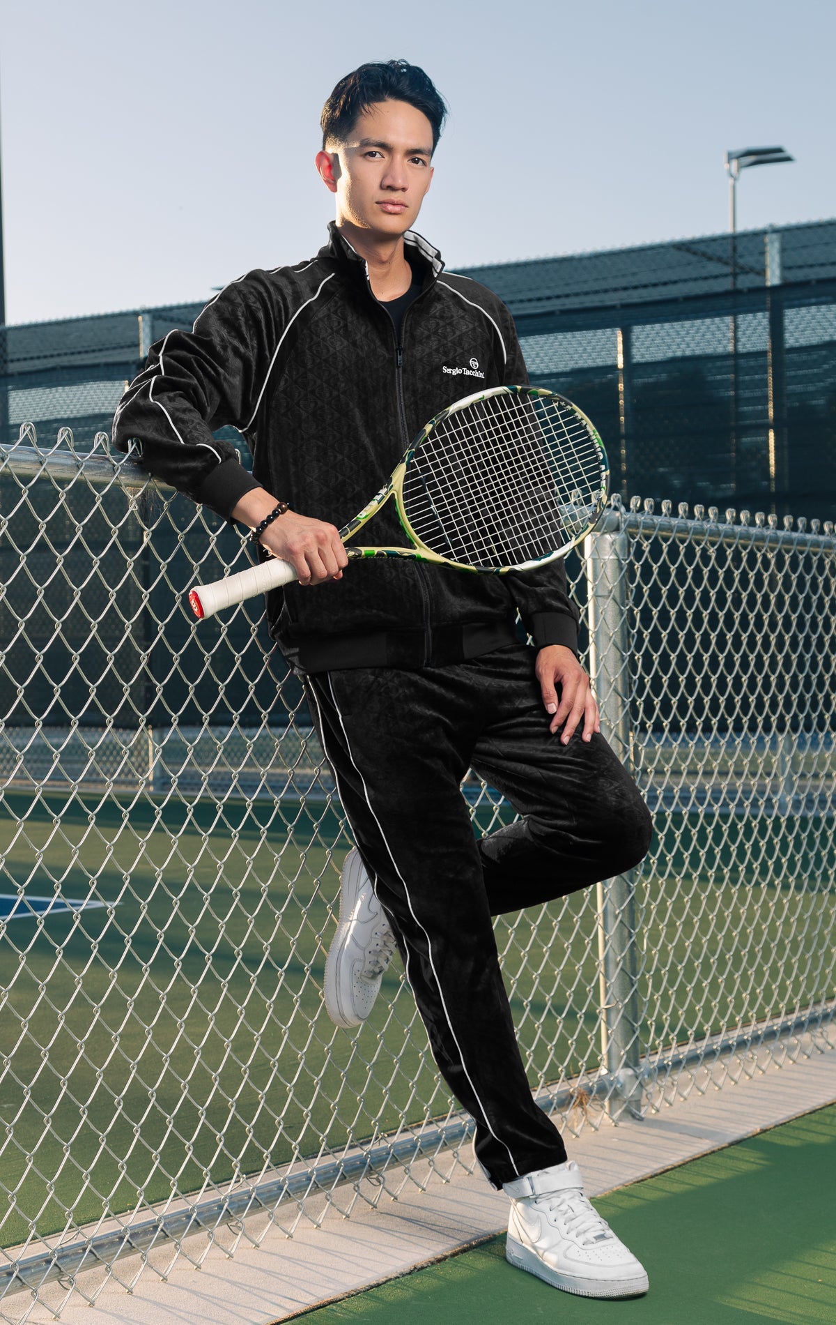 Black premium velour tracksuit featuring a Sergio Tacchini logo embroidered