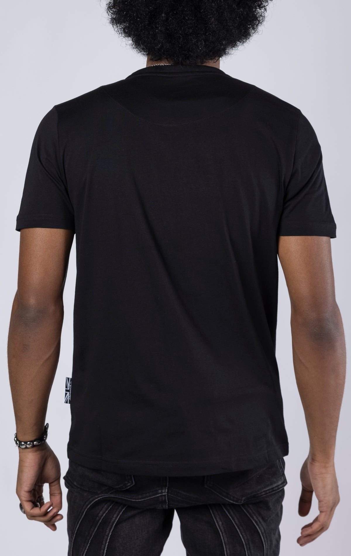 Heart of the Storm Crewneck Tee. Features a "heart of the storm" soft-touch digital print and 3D embroidered "blessed" detail. Made from 100% 190gsm mid-weight cotton jersey.