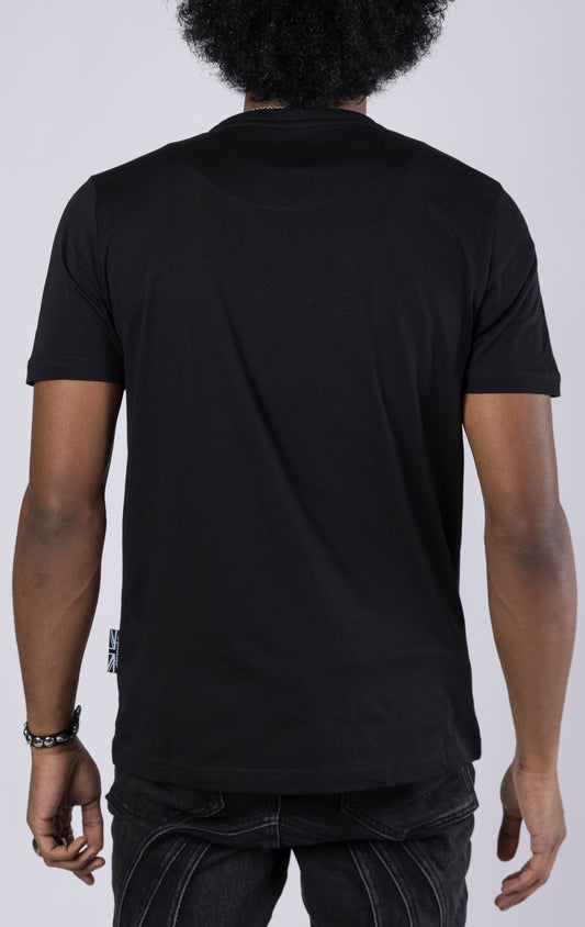 Heart of the Storm Crewneck Tee. Features a "heart of the storm" soft-touch digital print and 3D embroidered "blessed" detail. Made from 100% 190gsm mid-weight cotton jersey.