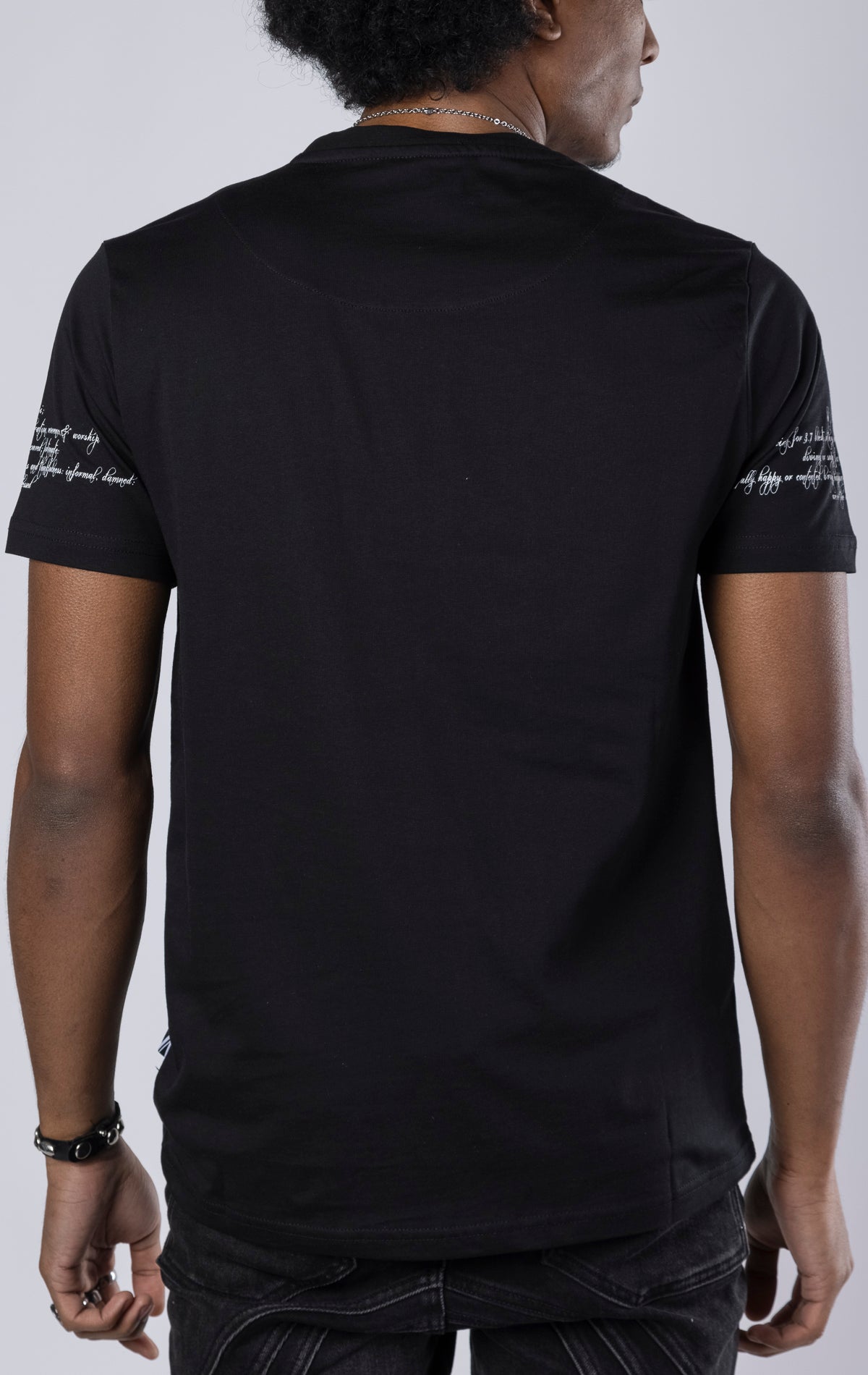 Calling of the Wild Crewneck Tee. Features a soft-touch digital print of nature-inspired imagery on the front and sleeves. Made from 100% 190gsm mid-weight cotton jersey.