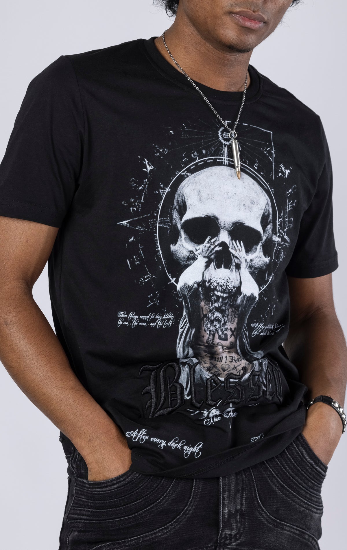 Blessed Eclipse Crewneck Tee. Features a soft-touch digital eclipse print, 3D embroidered "blessed" detail, and a woven "blessed" tab. Made from 100% 190gsm mid-weight cotton jersey.