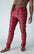 Patterned red dress pants.