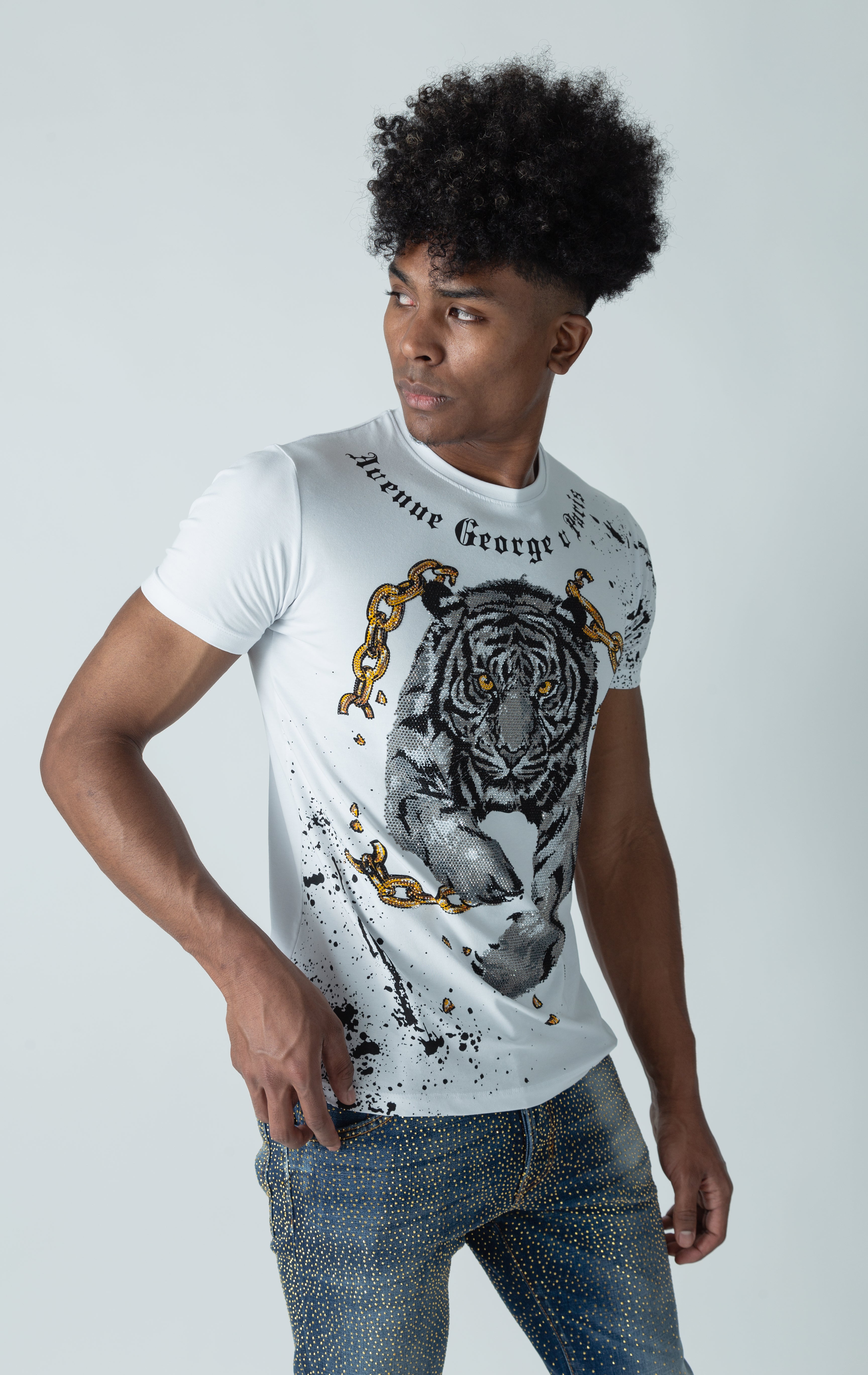White George V tiger in chain t shirt. Logo on collar.