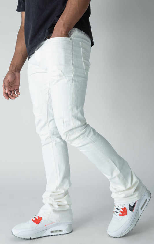 white stacked denim with ripped design