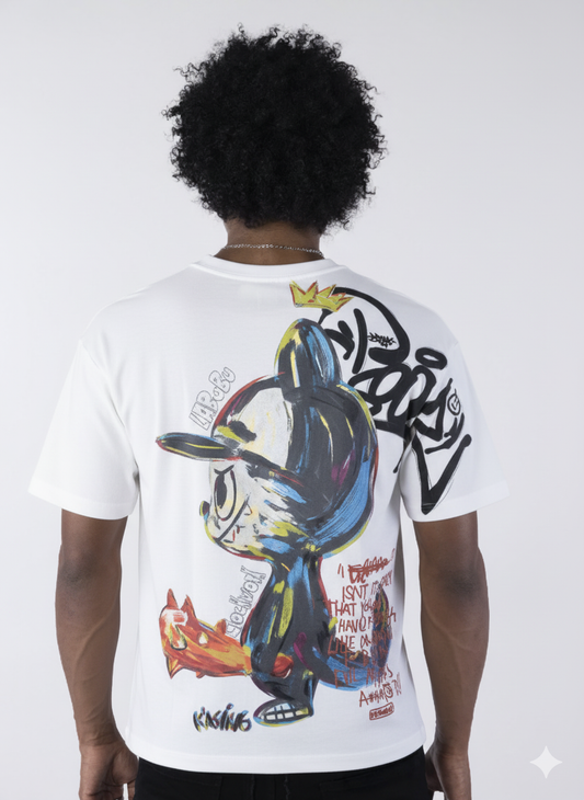 Person wearing a white t-shirt with colorful graphic design on the back