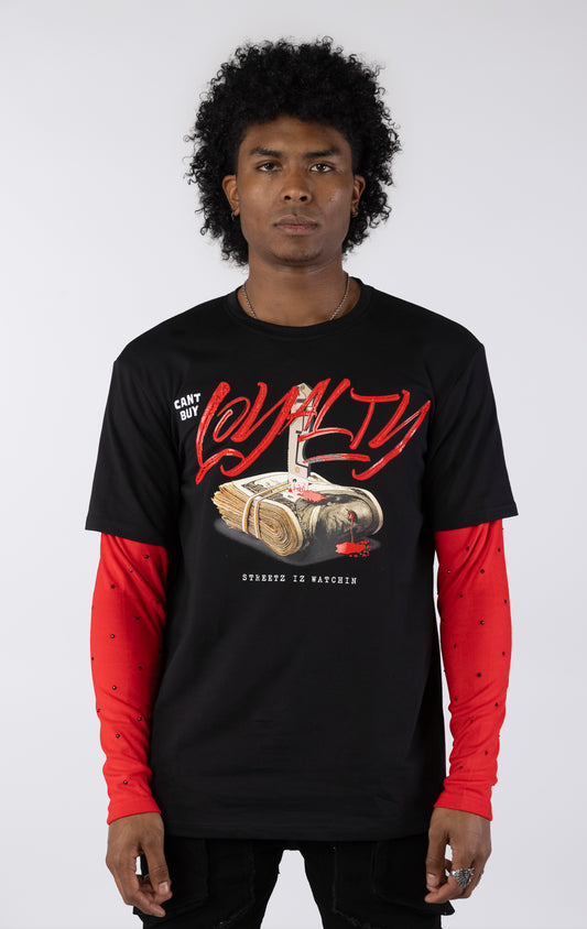 Black short-sleeve t-shirt with a red long-sleeve underneath, featuring a graphic of a stack of money stabbed by a knife and red blood. The word "LOYALTY" is printed in large red script, with "CANT BUY" and "STREETZ IZ WATCHIN" completing the design.