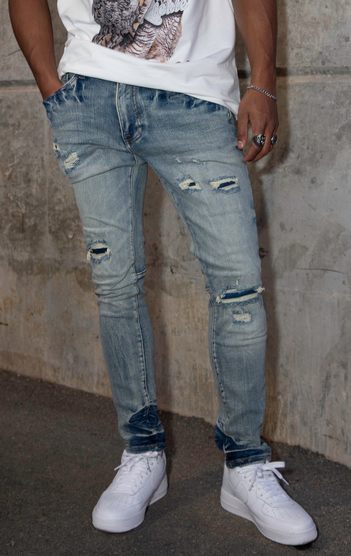 Ripped denim pants in Florance blue