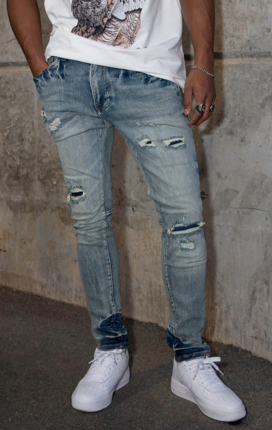 Ripped denim pants in Florance blue