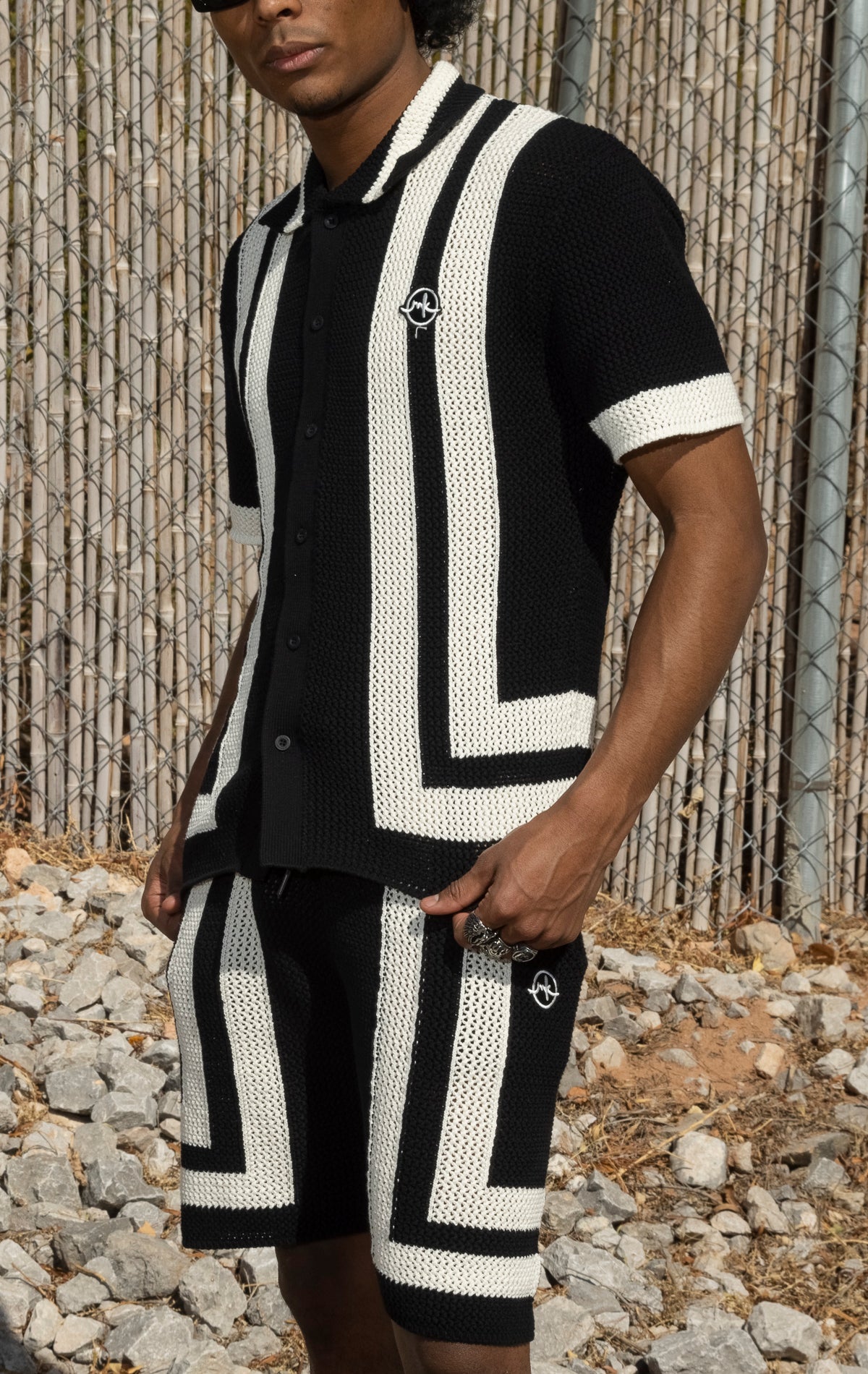 Black and white Crochet Summer Set. Includes a button-up shirt and shorts, both made from 100% cotton crochet knit fabric.