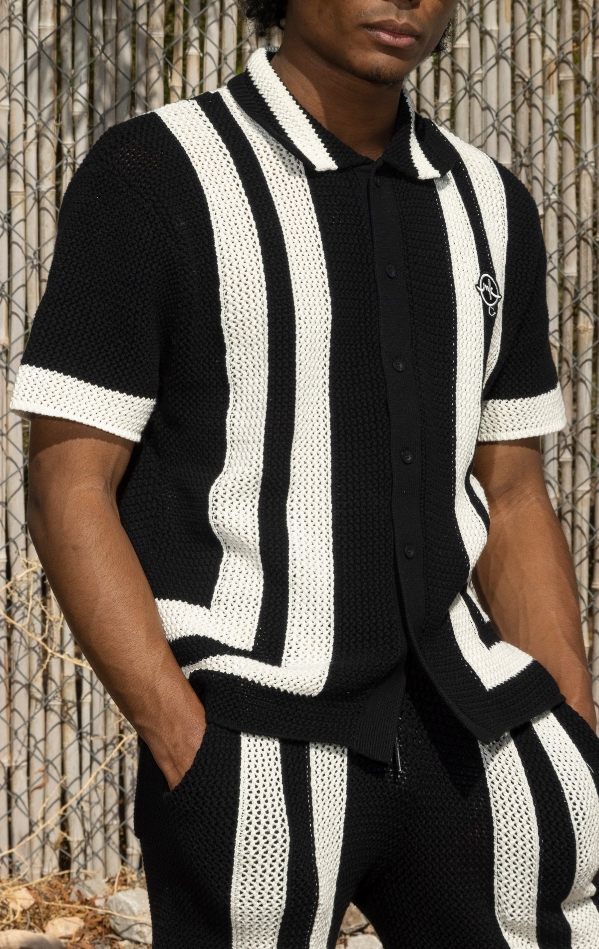 Black and white Crochet Summer Set. Includes a button-up shirt and shorts, both made from 100% cotton crochet knit fabric.