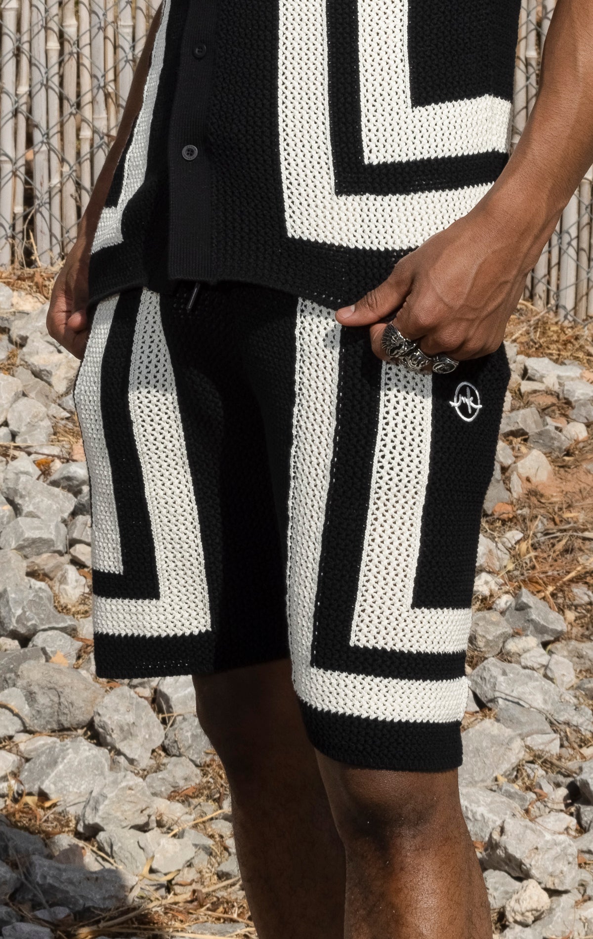 Black and white Crochet Summer Set. Includes a button-up shirt and shorts, both made from 100% cotton crochet knit fabric.