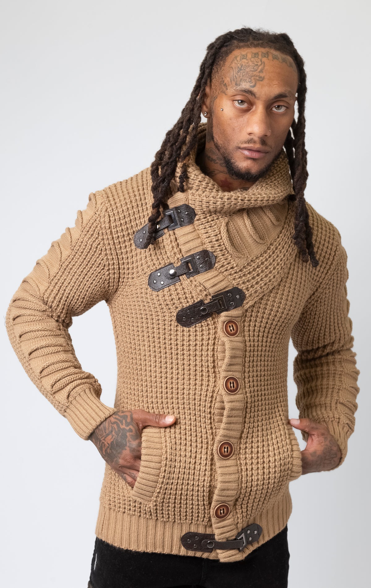 Model wearing brown versatile, high-quality sweater designed with heavy weight material to be worn in multiple ways