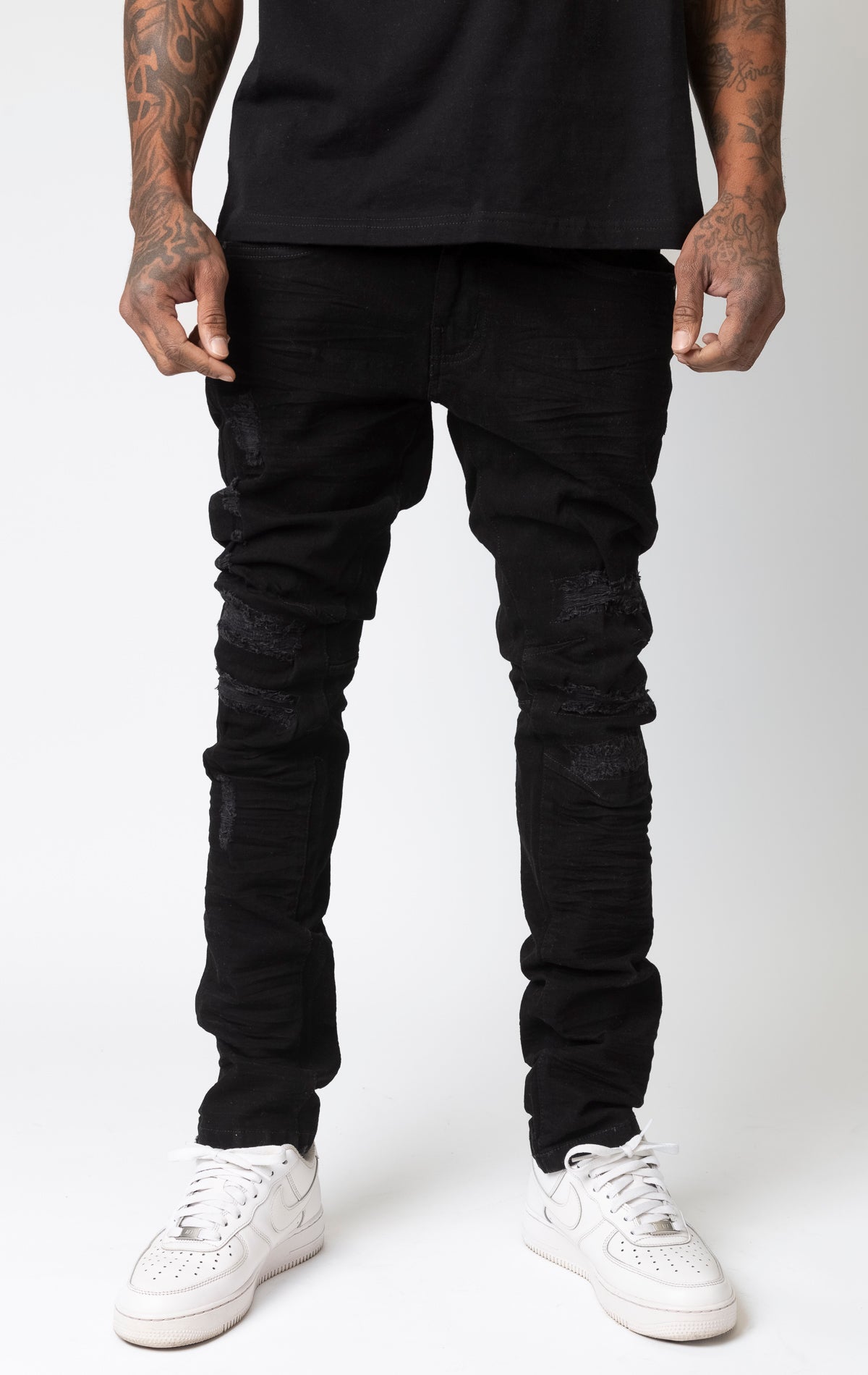 Black Washed up slim fit denim jeans, rip and repair style.