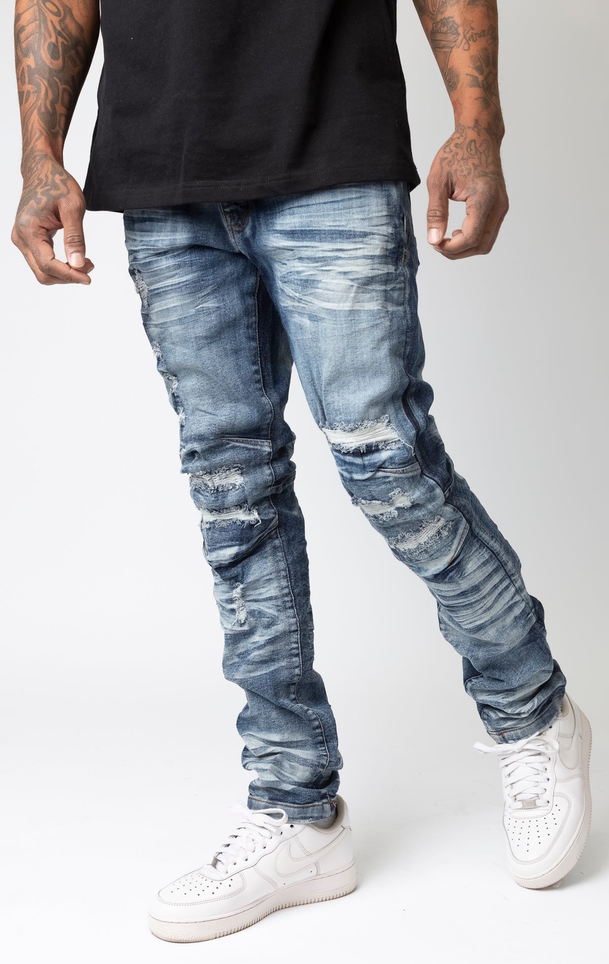 Solid blue Washed up slim fit denim jeans, rip and repair style.